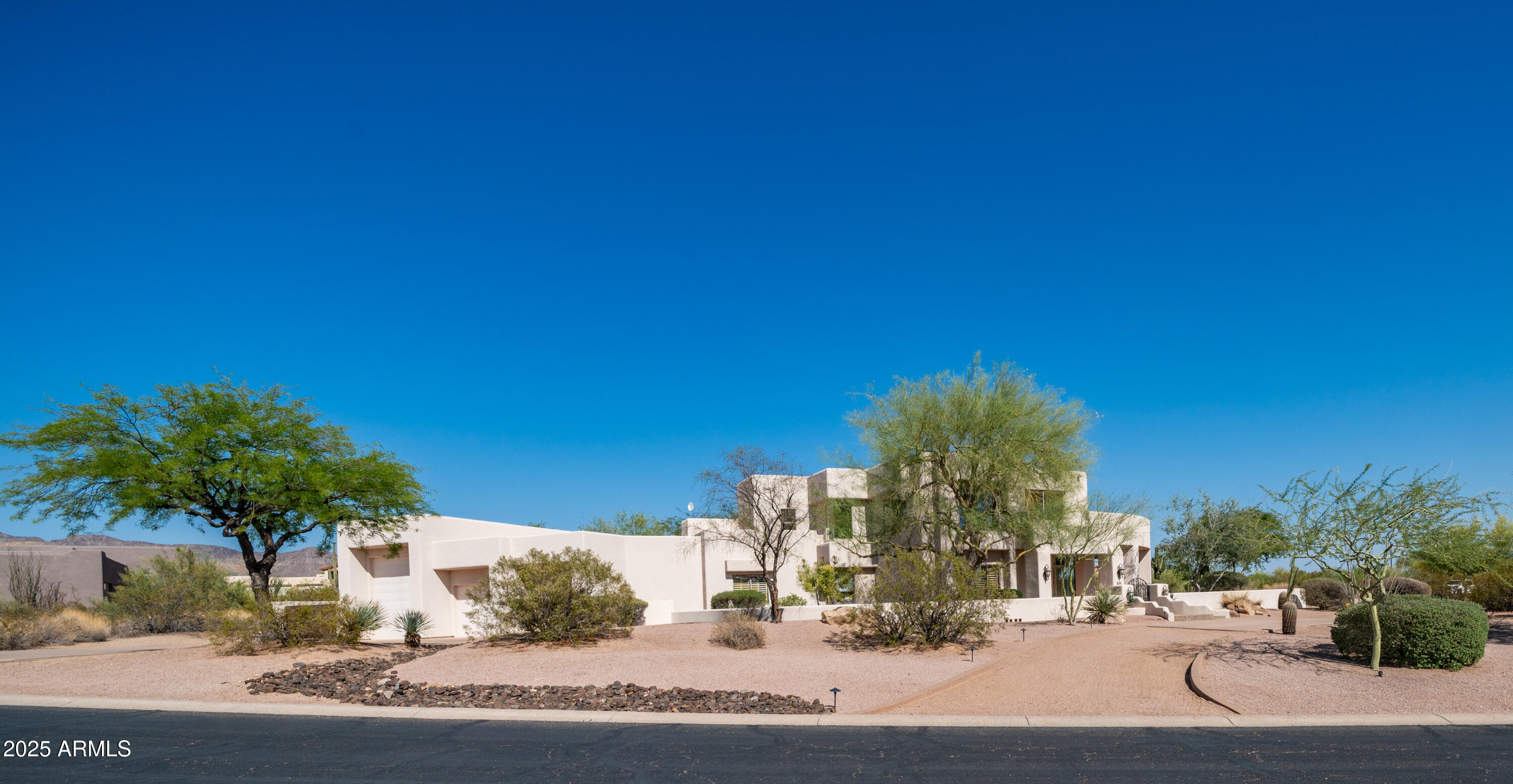 8540 East McDowell Road, Unit 116 Mesa, AZ 85207 - Photo 38 of 64 a view of a multi story building