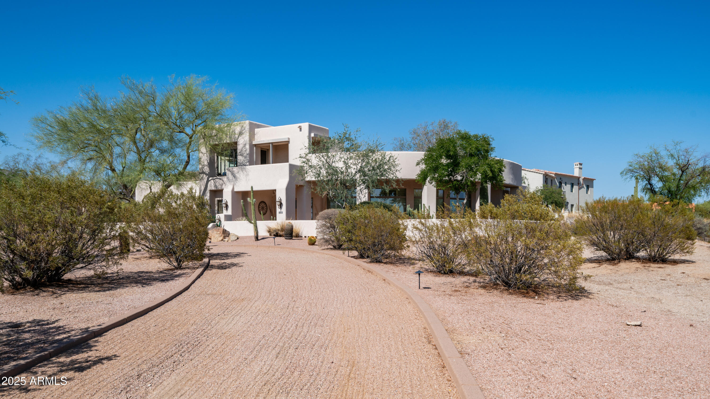 8540 East McDowell Road, Unit 116 Mesa, AZ 85207 - Photo 52 of 64 a view of a house with a yard