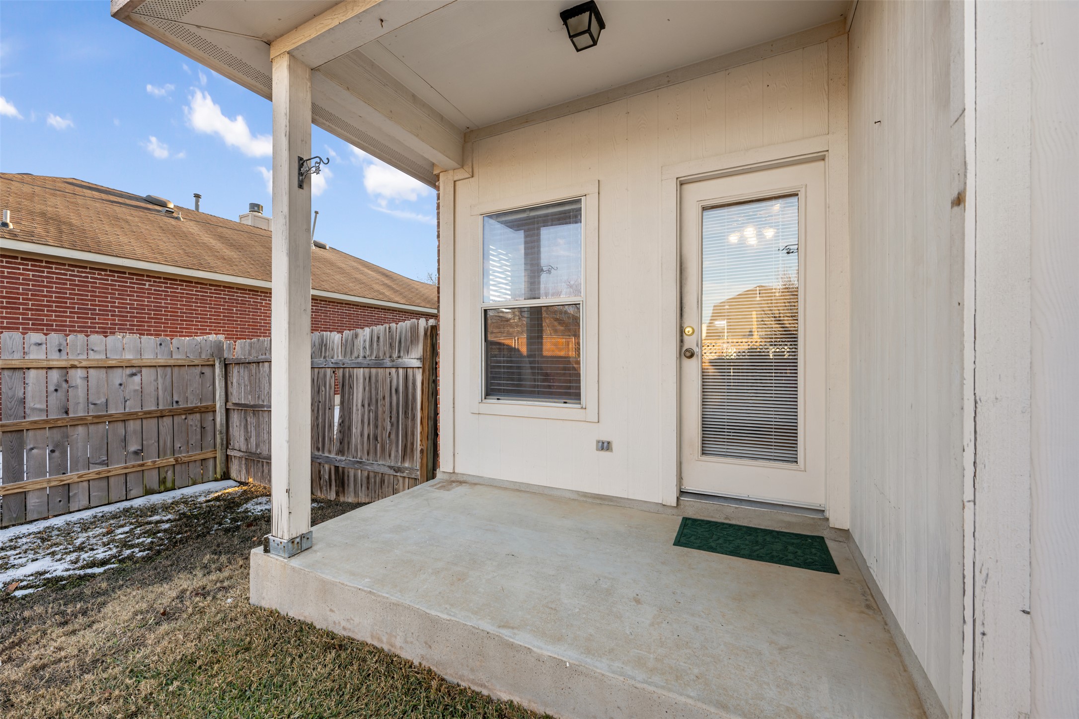 804 Estancia Way Leander, TX 78641 - Photo 16 of 40 a view of a glass door and a window