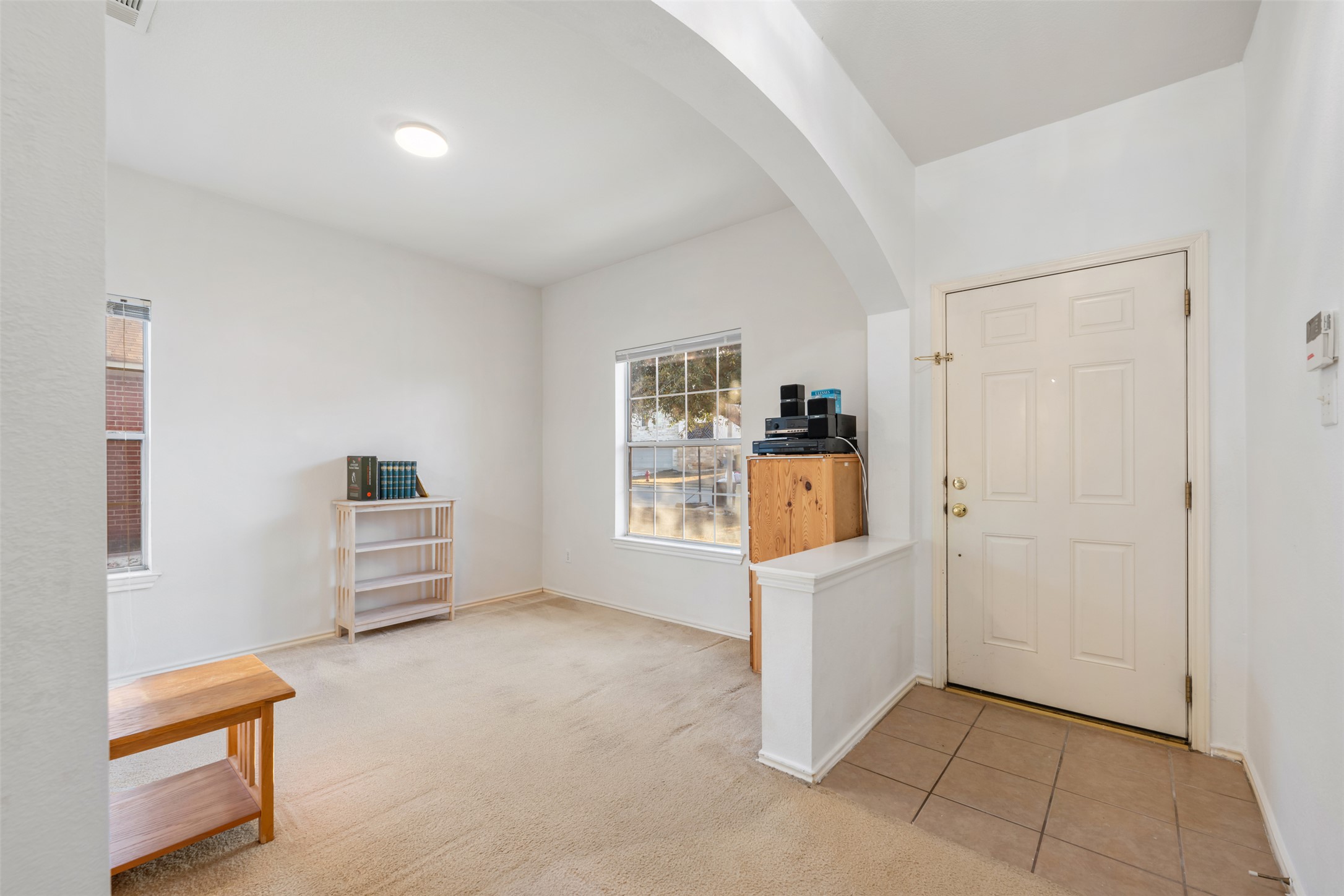 804 Estancia Way Leander, TX 78641 - Photo 3 of 40 a room with furniture and window