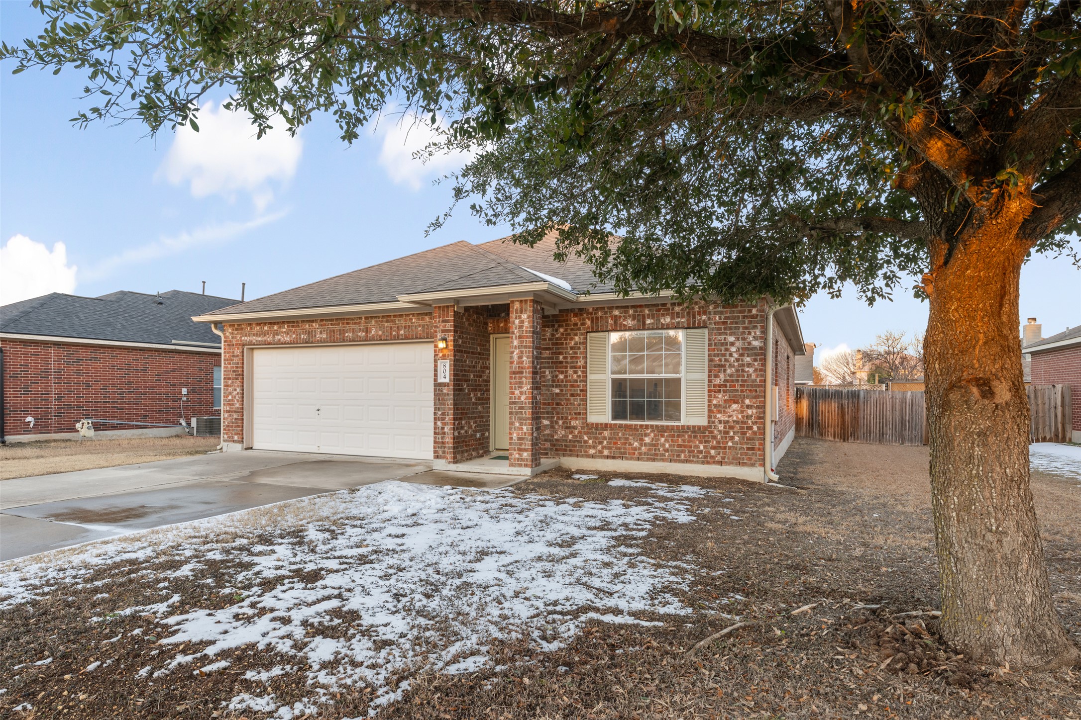 804 Estancia Way Leander, TX 78641 - Photo 38 of 40 a front view of a house with a yard and garage