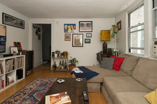 a room with furniture and a wooden floor