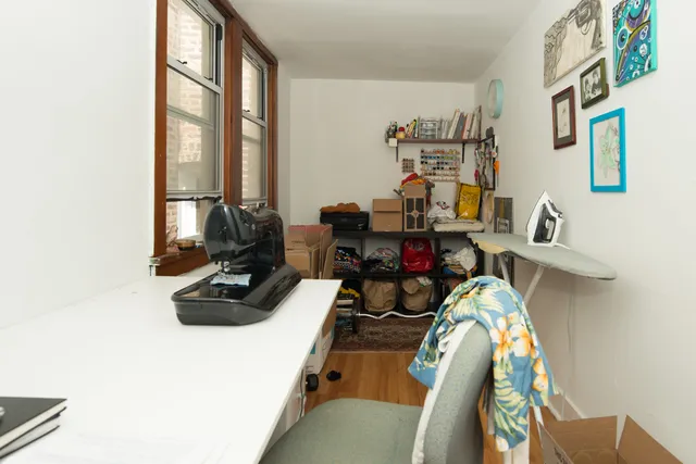 a view of a hallway with workspace