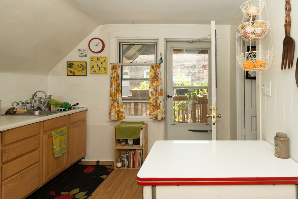 2015 West Iowa Street, Unit 2 Chicago, IL 60622 - Photo 4 of 20 a bed room with a bed and a table in it