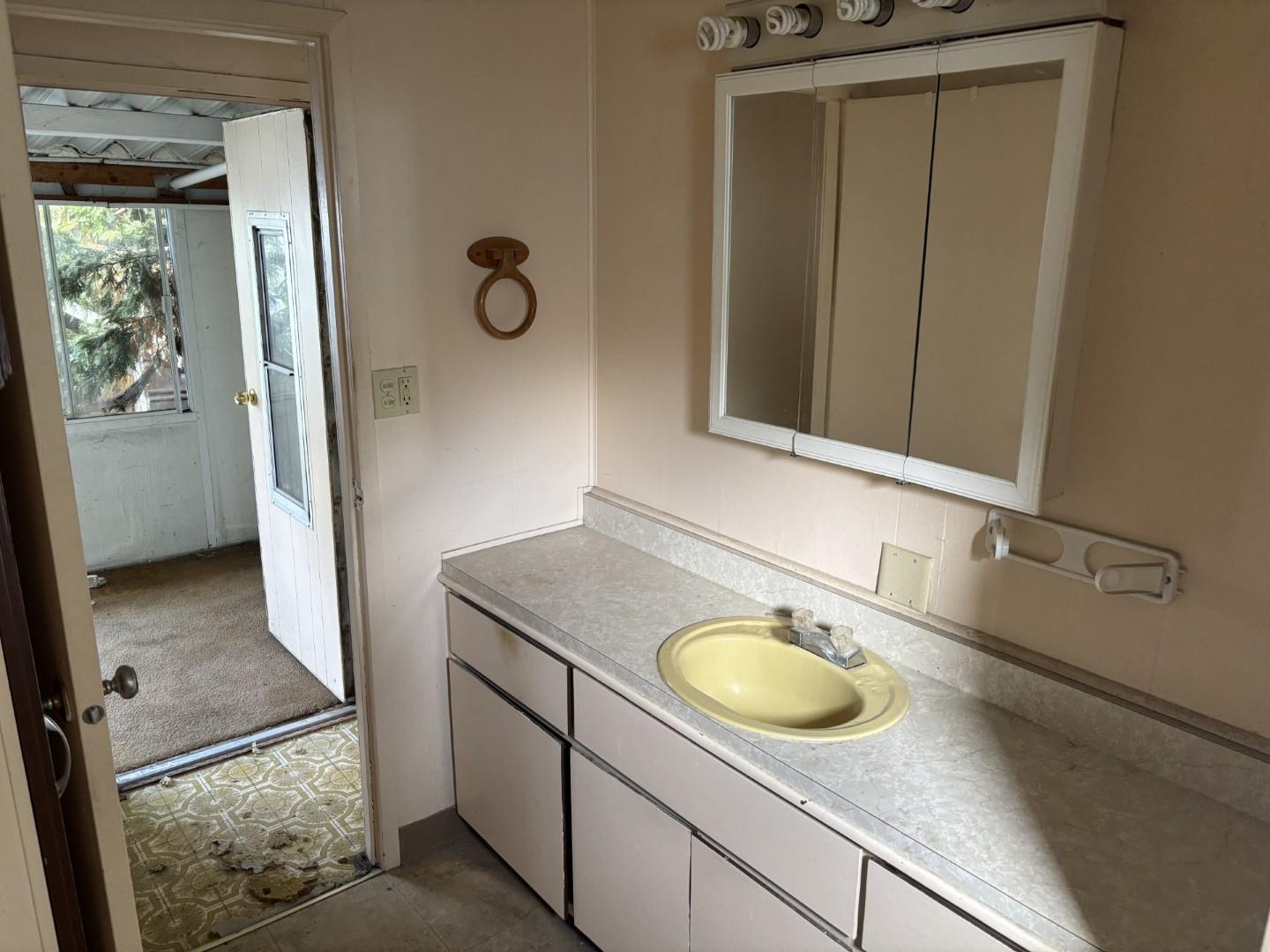 2933 Forebay Road, Unit 32 Pollock Pines, CA 95726 - Photo 11 of 15 a bathroom with a sink and a mirror