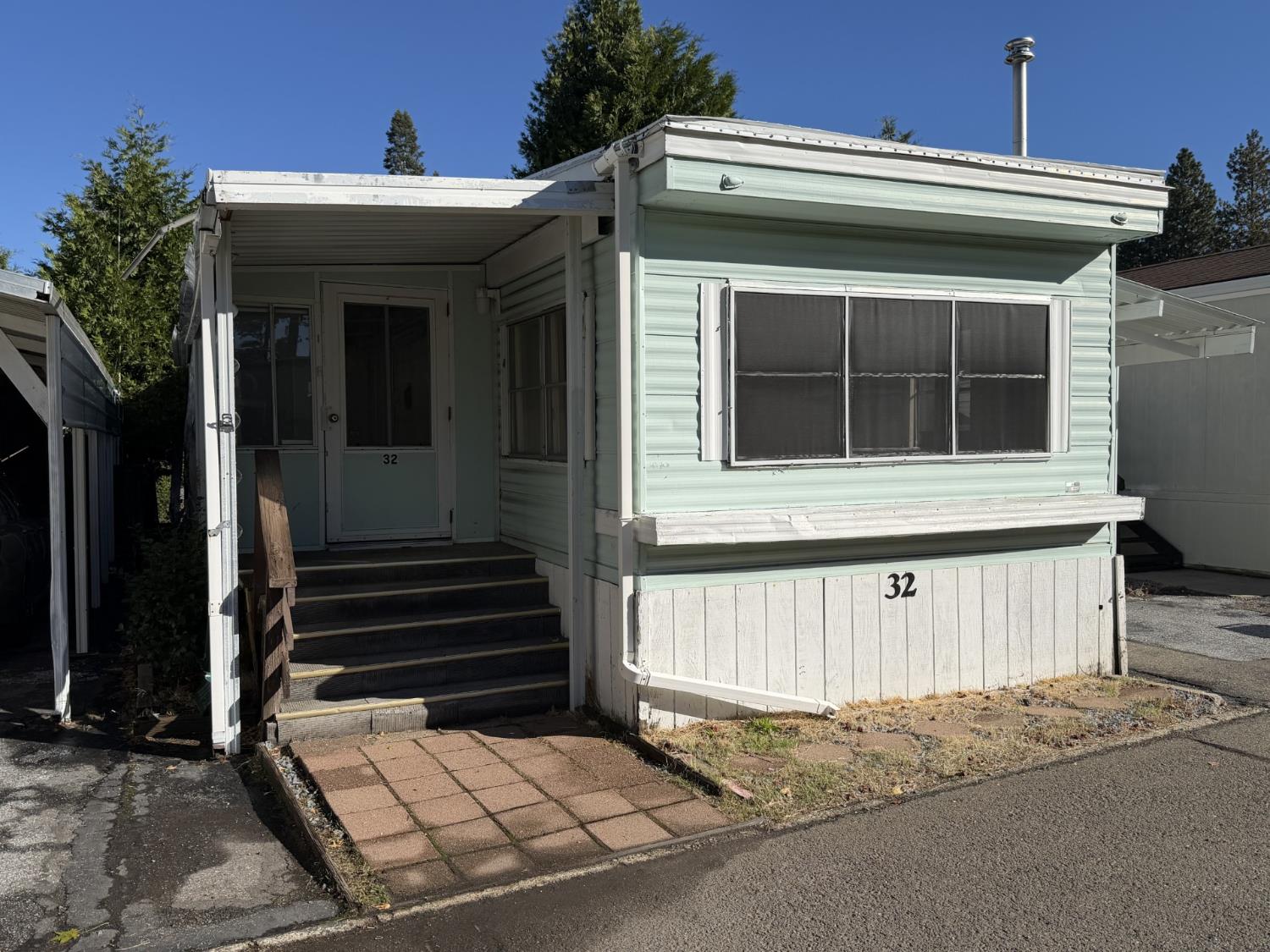 2933 Forebay Road, Unit 32 Pollock Pines, CA 95726 - Photo 2 of 15 a view of a house with entrance and door