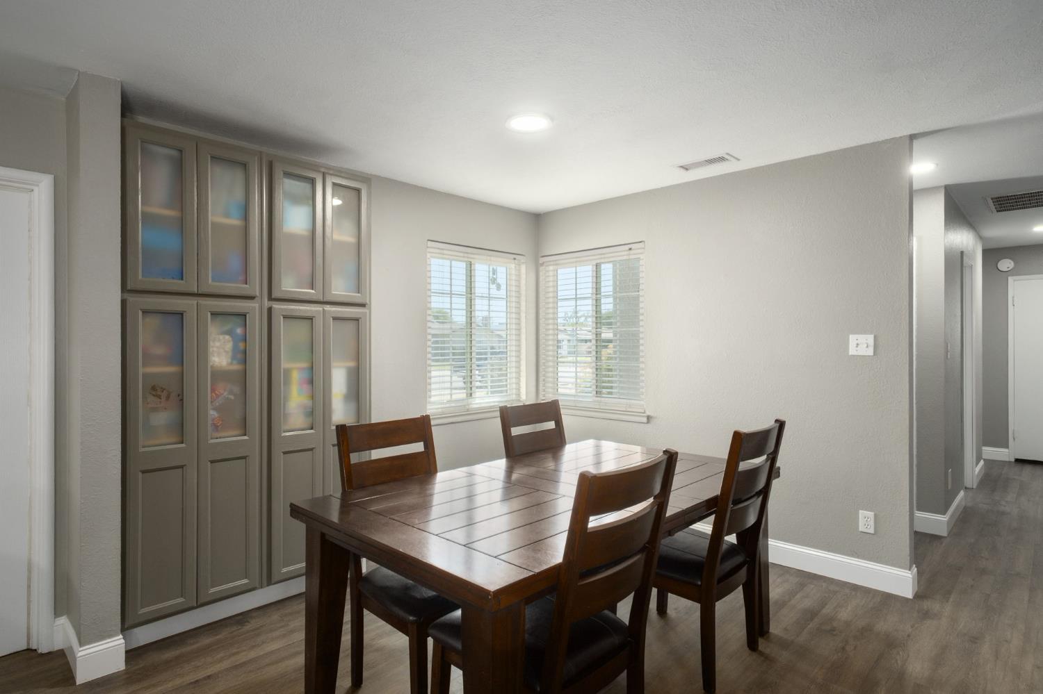 2604 Harvard Avenue Clovis, CA 93612 - Photo 12 of 28 a view of a dining room with furniture and wooden floor
