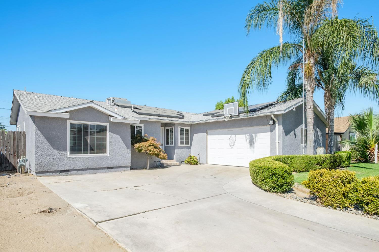 2604 Harvard Avenue Clovis, CA 93612 - Photo 2 of 28 a view of a house with a patio