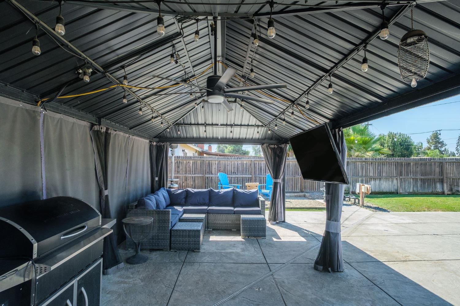 2604 Harvard Avenue Clovis, CA 93612 - Photo 23 of 28 a view of a backyard with seating space