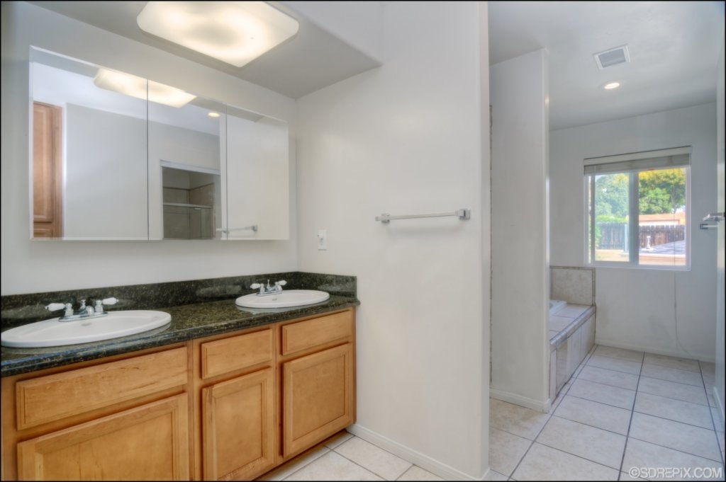 10140 Casa De Oro Spring Valley Spring Valley, CA 91977 - Photo 14 of 24 Master Bathroom features dual sinks....