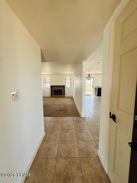 31632 Treasure Road Parker, AZ 85344 - Photo 4 of 26 a view of empty room with a fireplace