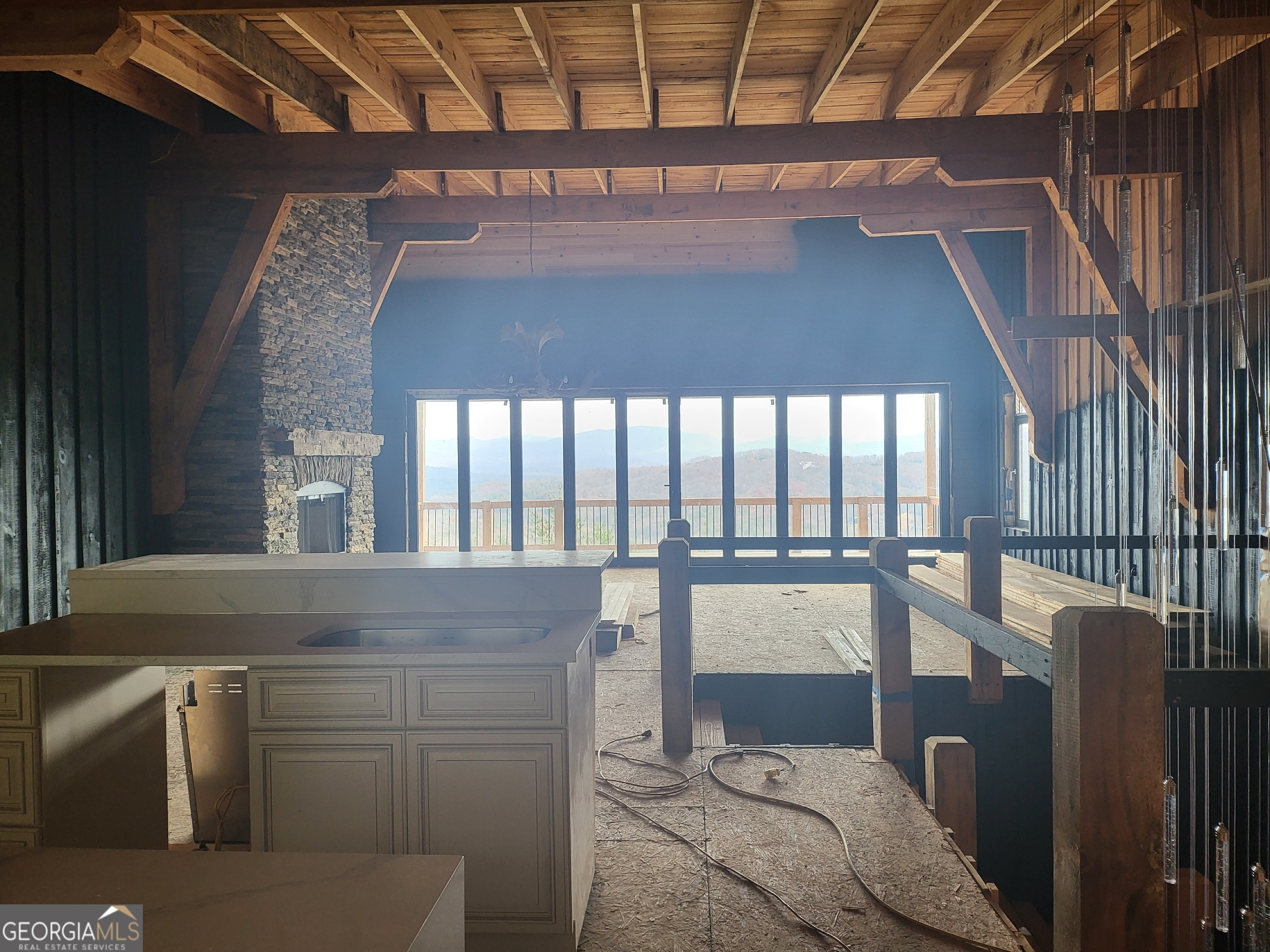 389 Fort Mountain Road Blairsville, GA 30512 - Photo 11 of 30 a view of a livingroom with furniture and staircase