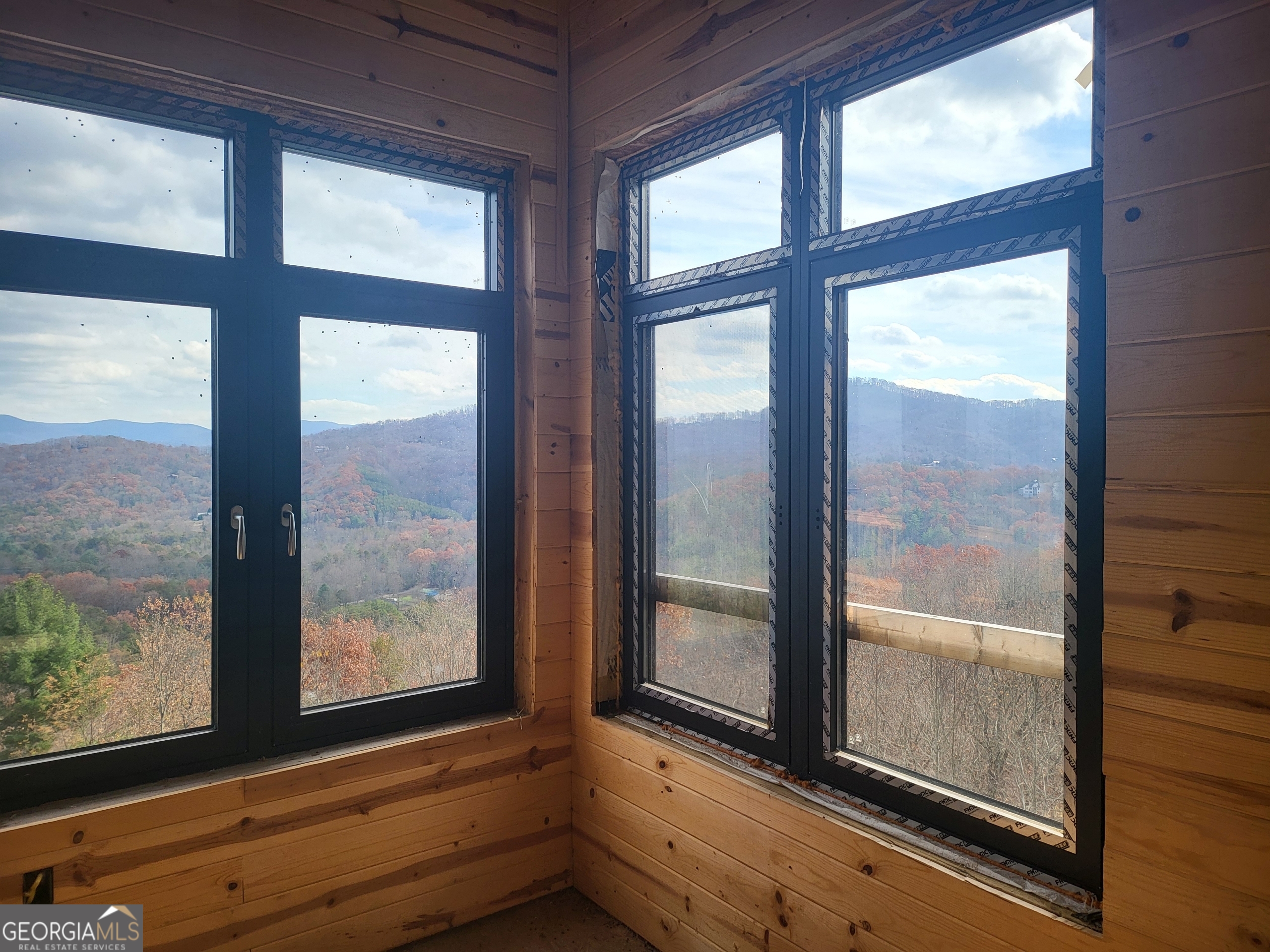 389 Fort Mountain Road Blairsville, GA 30512 - Photo 12 of 30 a view of room with window and front door