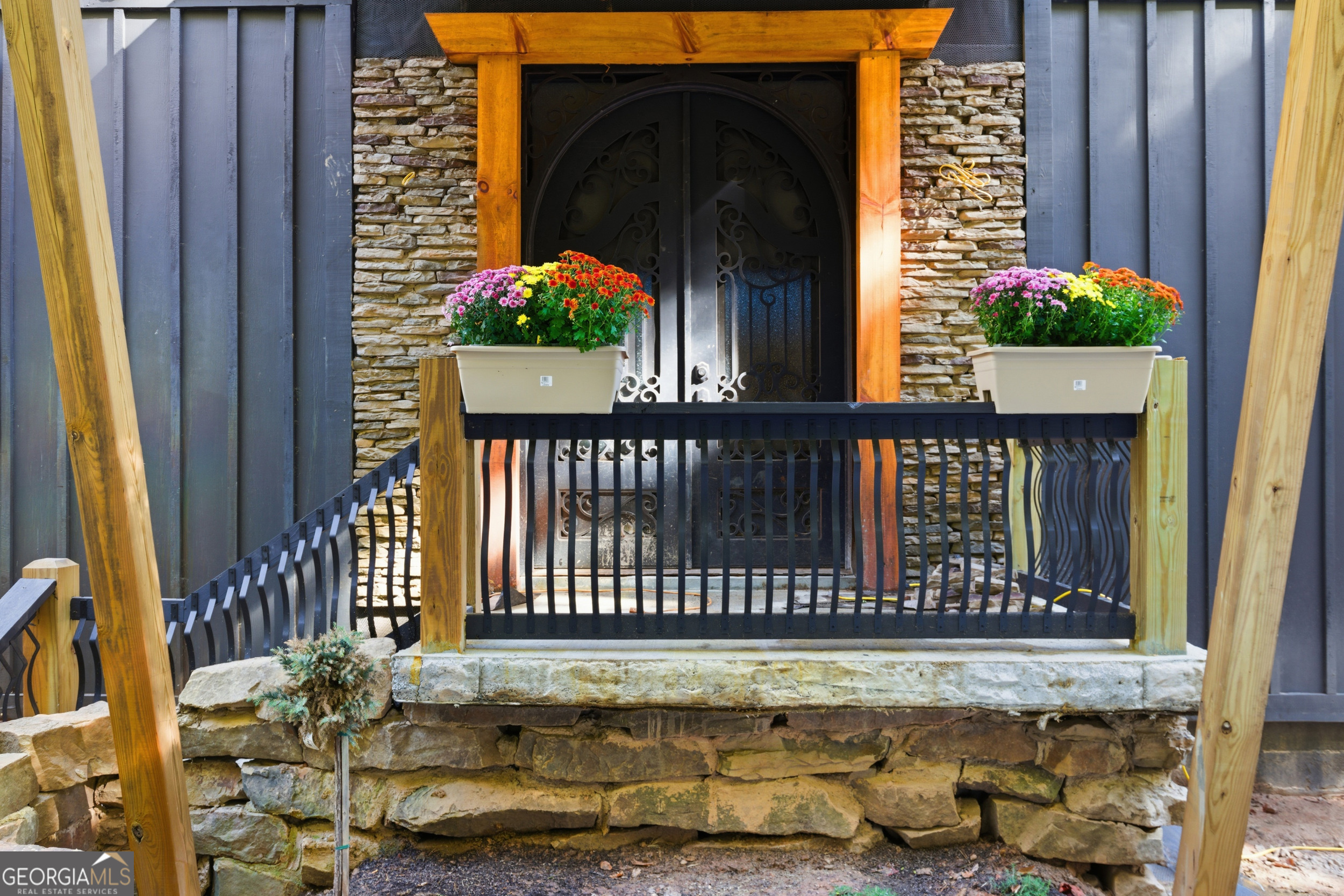389 Fort Mountain Road Blairsville, GA 30512 - Photo 5 of 30 a view of a house with a window and wooden fence
