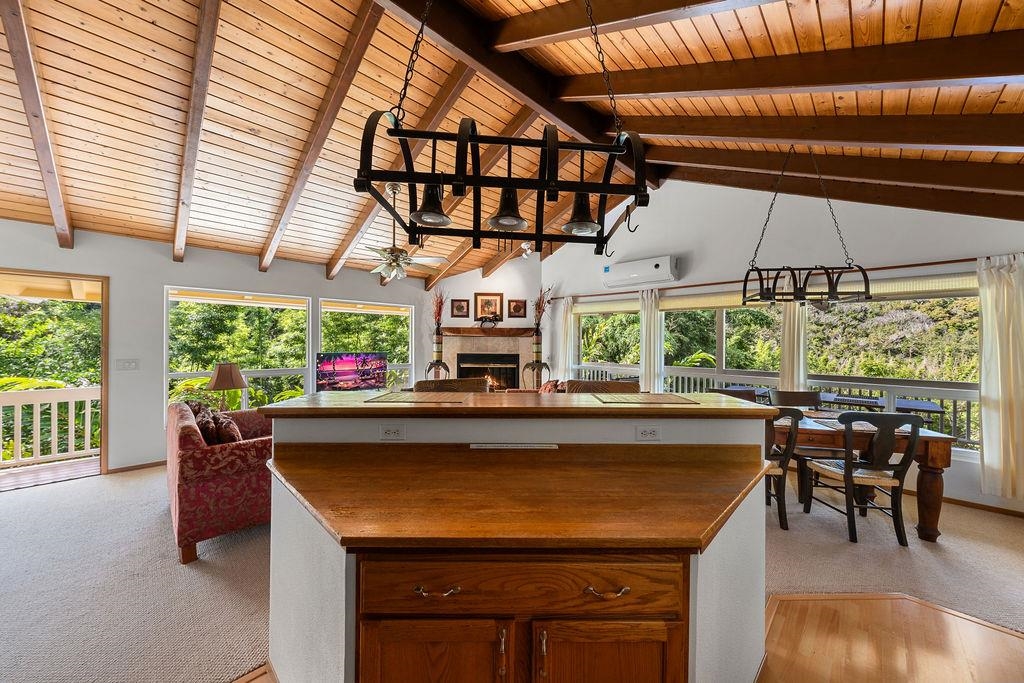 1444 West Kuiaha Road Haiku, HI 96708 - Photo 2 of 30 a room with furniture and a large window