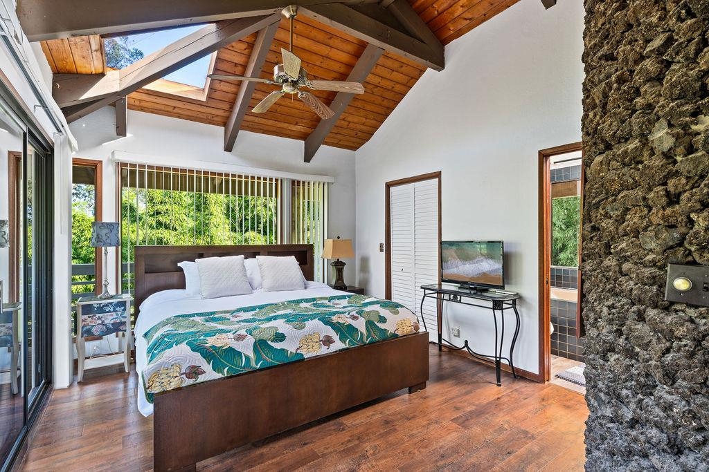 1444 West Kuiaha Road Haiku, HI 96708 - Photo 25 of 30 a bed room with a bed and a television