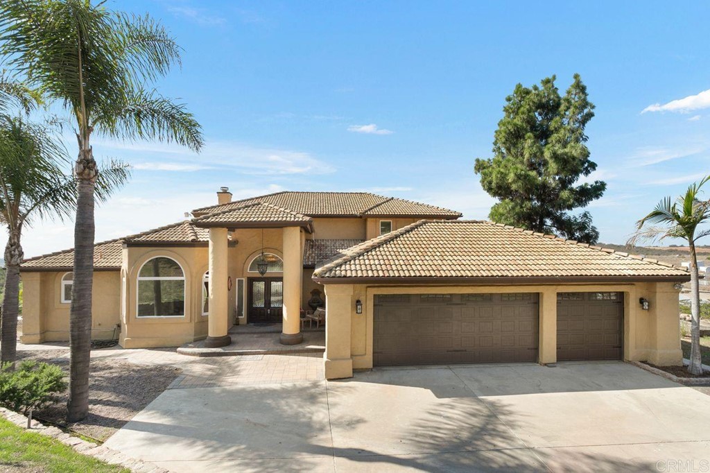 6190 Hidden Valley Road Fallbrook, CA 92028 - Photo 1 of 1 a front view of a house with a yard