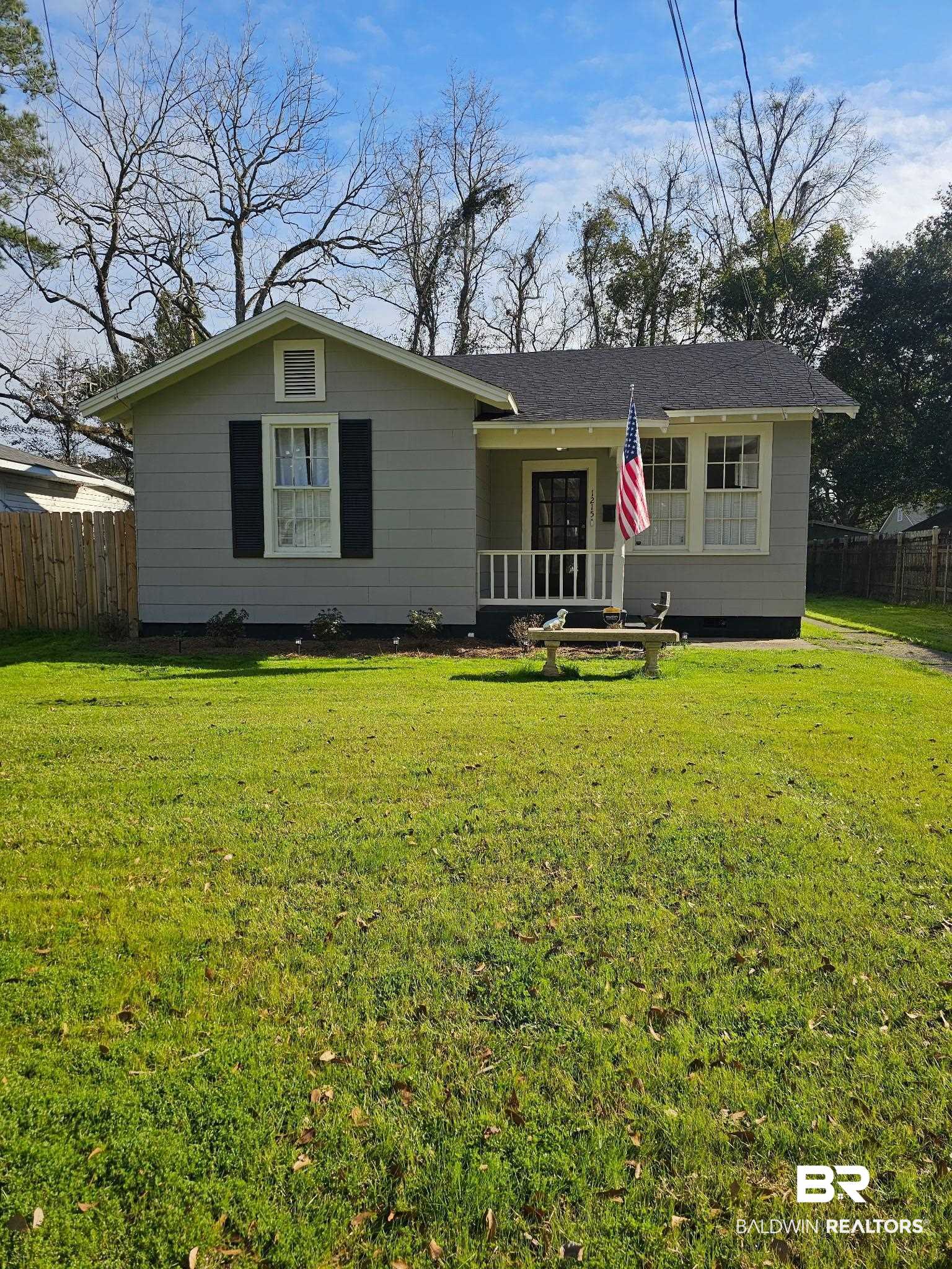 1215 Church Street Mobile, AL 36604 - Photo 1 of 23 Ranch-style home with fence and a front yard