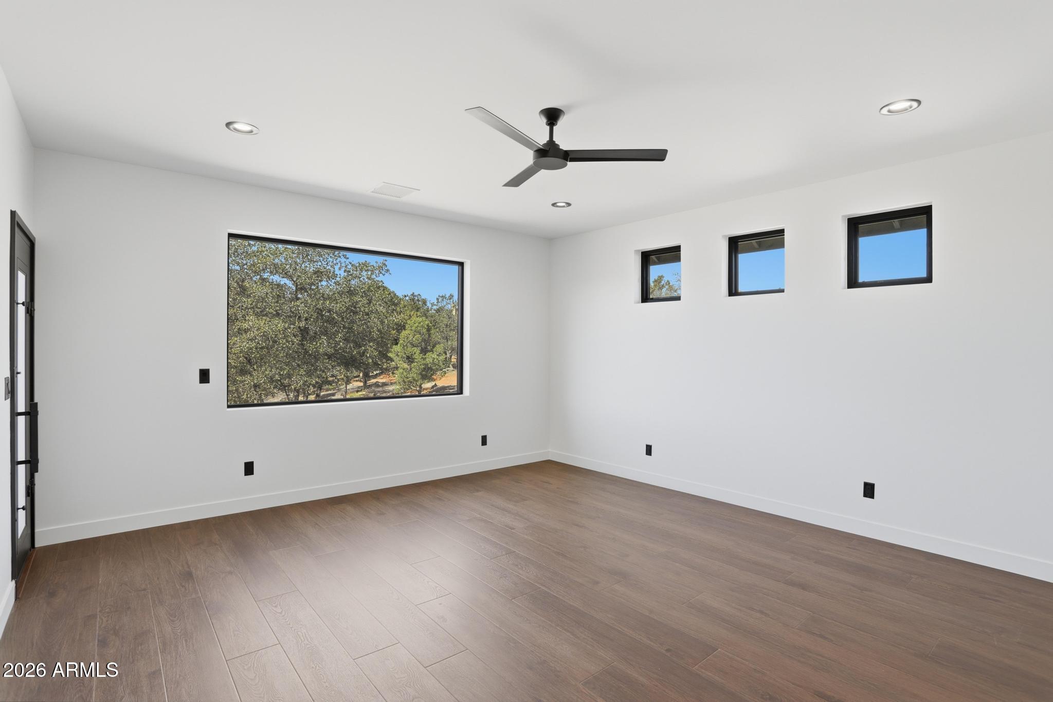 1112 South Kinzer Court Payson, AZ 85541 - Photo 19 of 41 a view of empty room with wooden floor