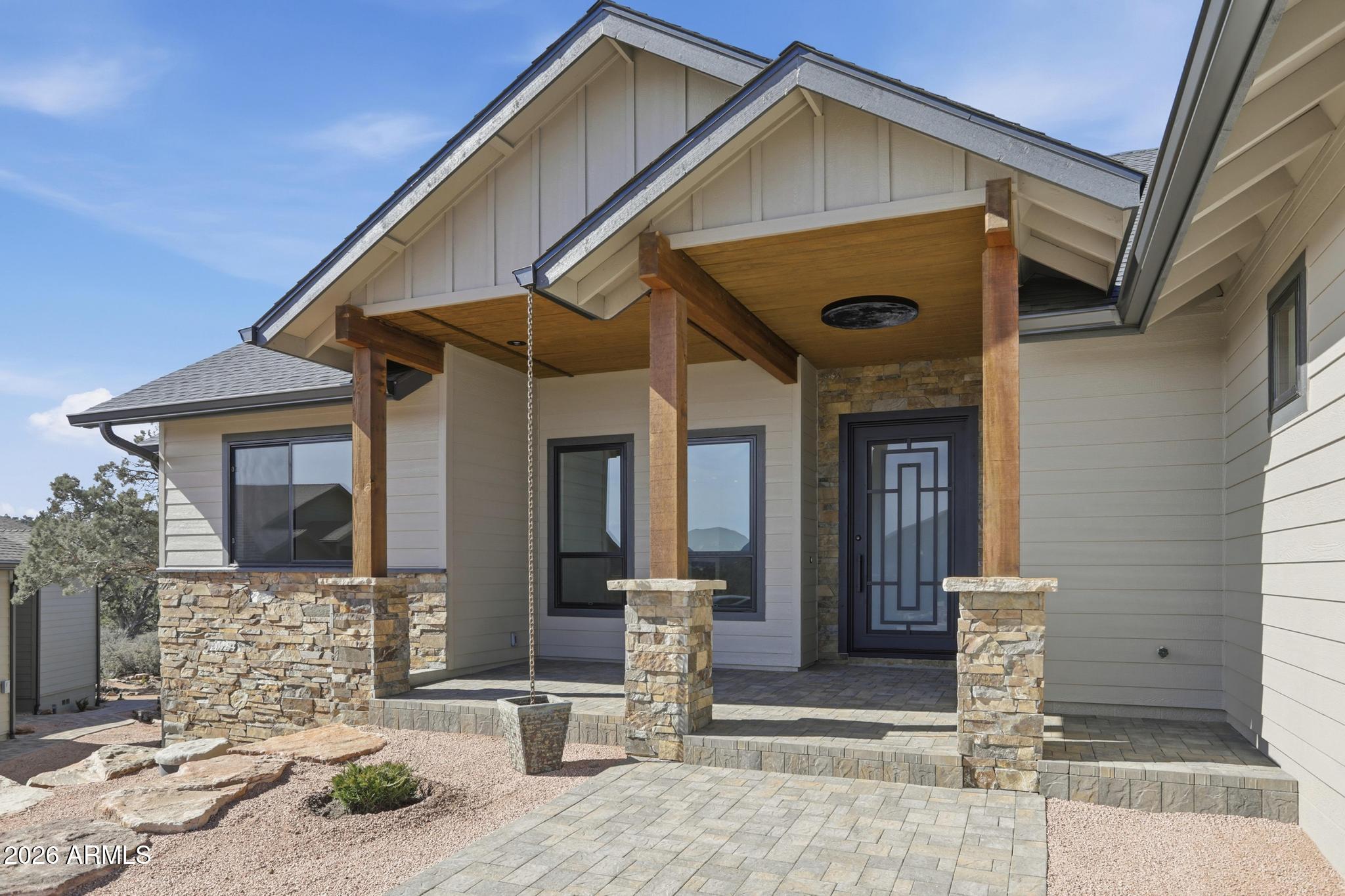 1112 South Kinzer Court Payson, AZ 85541 - Photo 32 of 41 a front view of a house with garden