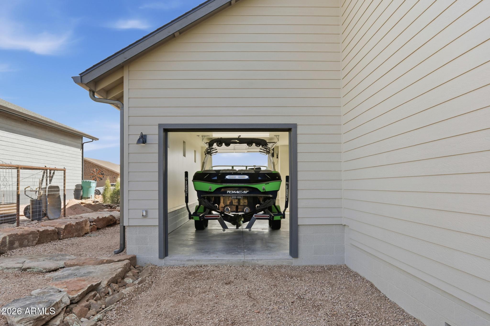 1112 South Kinzer Court Payson, AZ 85541 - Photo 34 of 41 a view of a patio with a table and chairs and potted plants