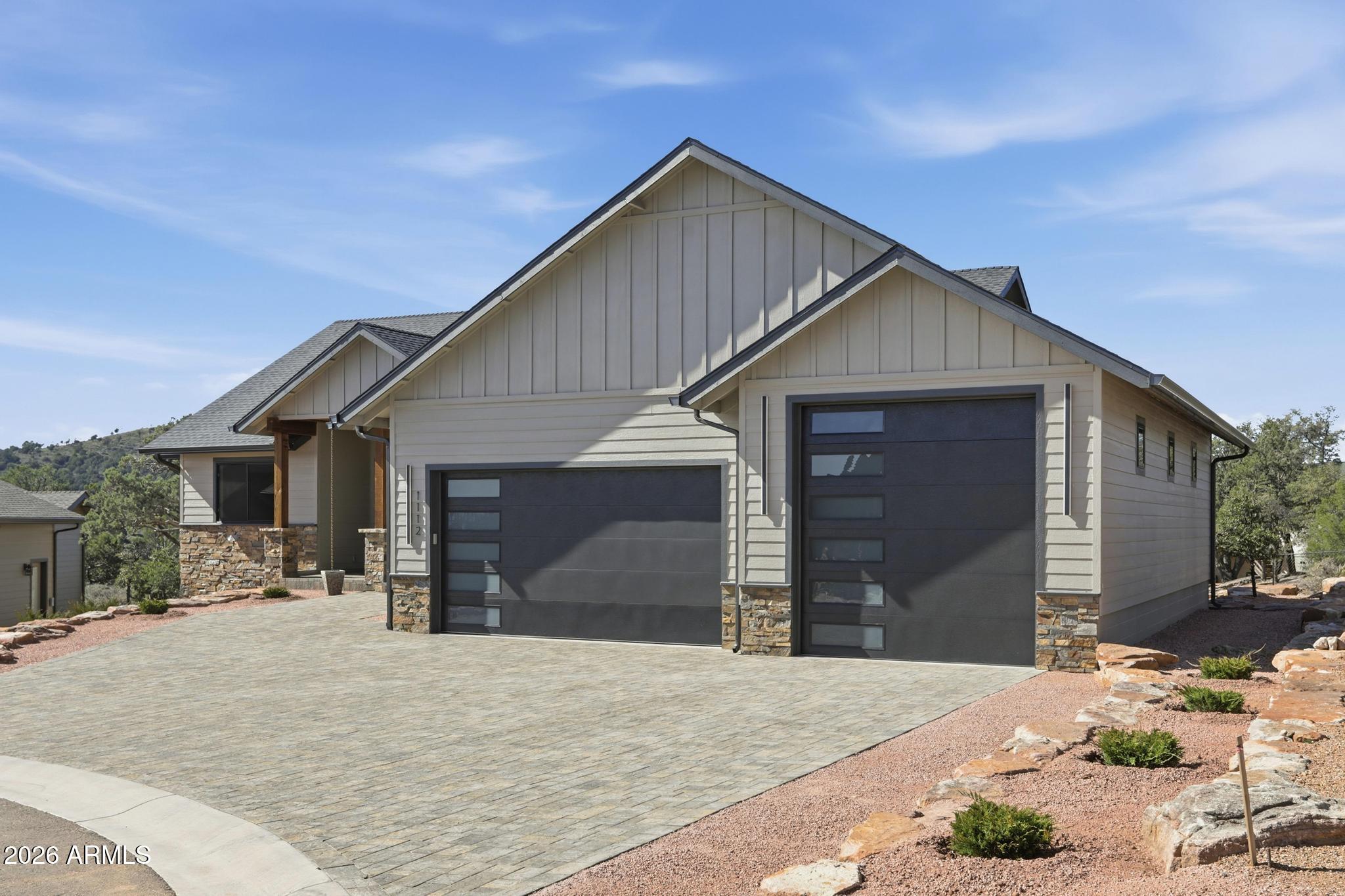 1112 South Kinzer Court Payson, AZ 85541 - Photo 35 of 41 a front view of a house with a yard and garage