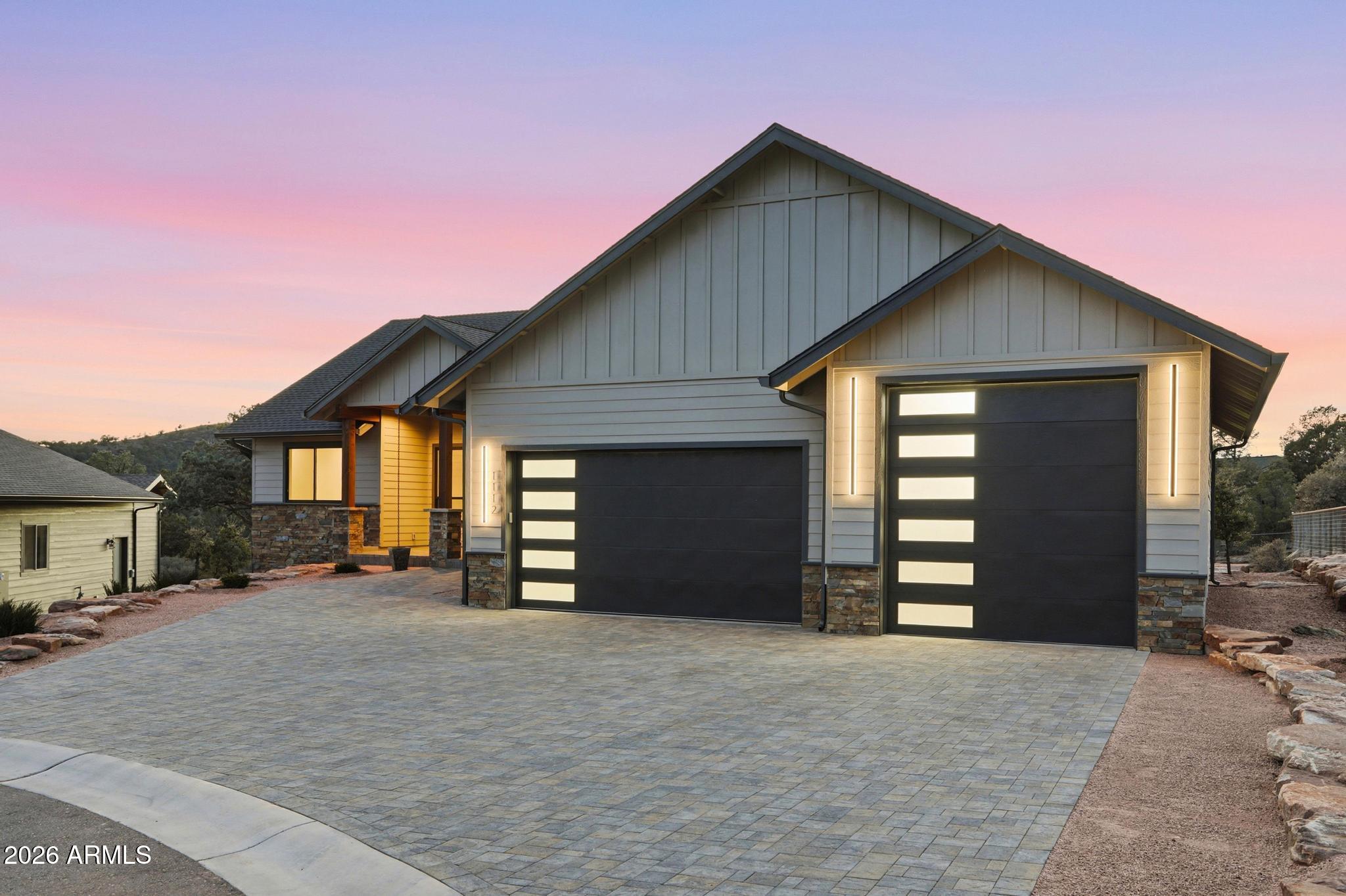 1112 South Kinzer Court Payson, AZ 85541 - Photo 40 of 41 a front view of a house with a yard and garage