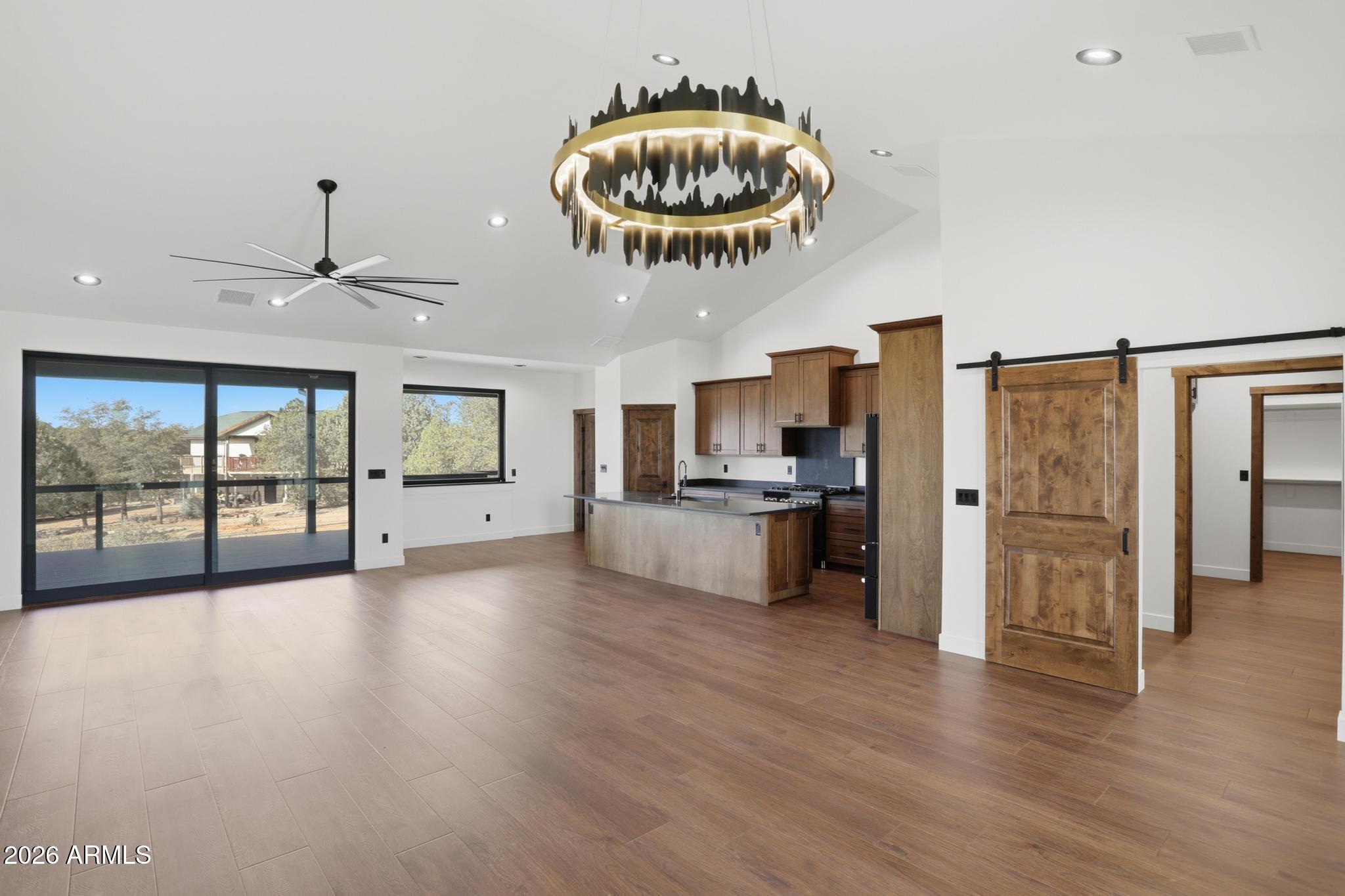 1112 South Kinzer Court Payson, AZ 85541 - Photo 7 of 41 a view of a kitchen with a sink a refrigerator and window