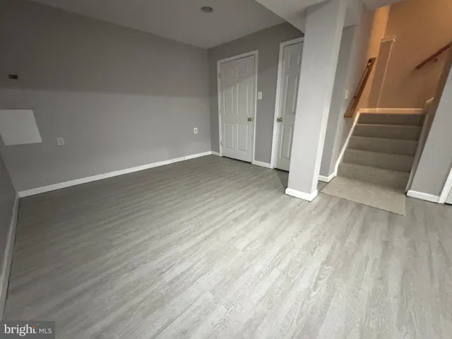 a view of entryway with wooden floor