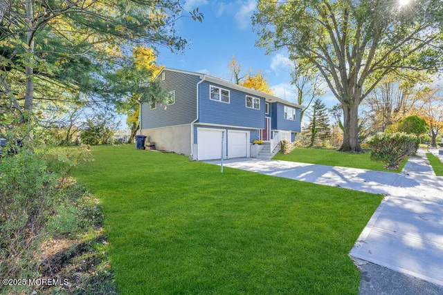 a view of a house with a big yard