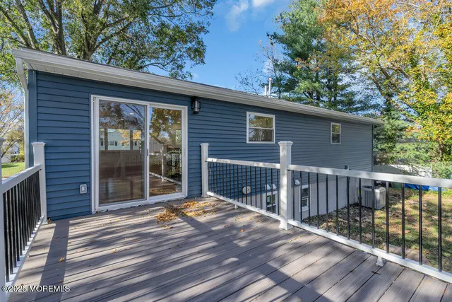 a balcony with wooden floor