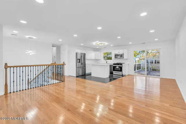 a view of a kitchen with a sink