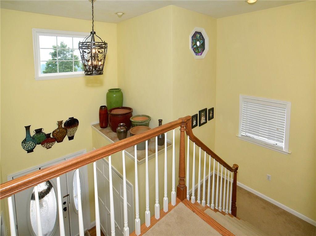 221 Meadow Spring Road Greensburg, PA 15601 - Photo 11 of 25 Two-story entry has beautiful design features including a stain-glass, octagon window.