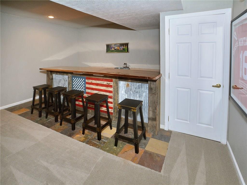 221 Meadow Spring Road Greensburg, PA 15601 - Photo 19 of 25 Custom built bar in the finished basement.