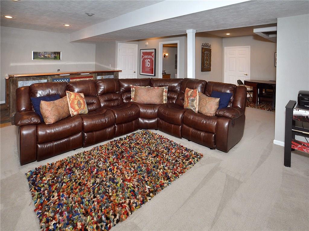 221 Meadow Spring Road Greensburg, PA 15601 - Photo 21 of 25 Game room also includes a sitting area, bathroom, storage, and is a walk-out.