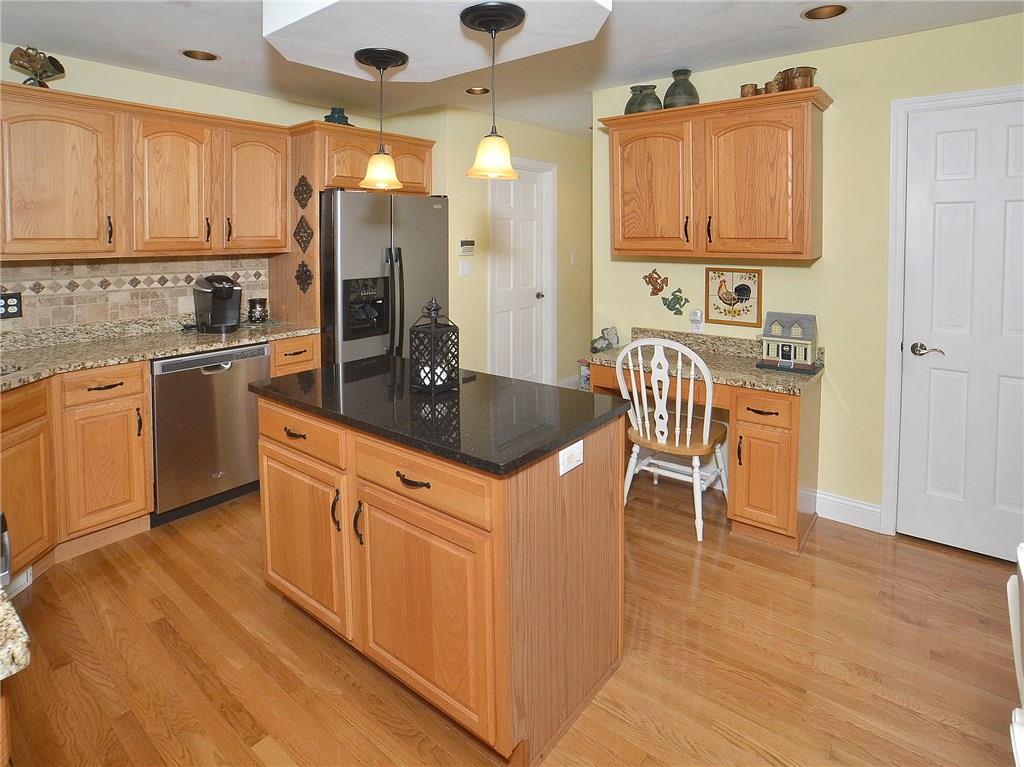 Stay organized with the kitchen desk station and walk-in pantry.
