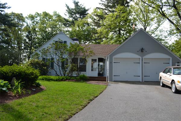 12 Oldham Road Arlington, MA 02474 - Photo 3 of 7 a view of a house with a yard
