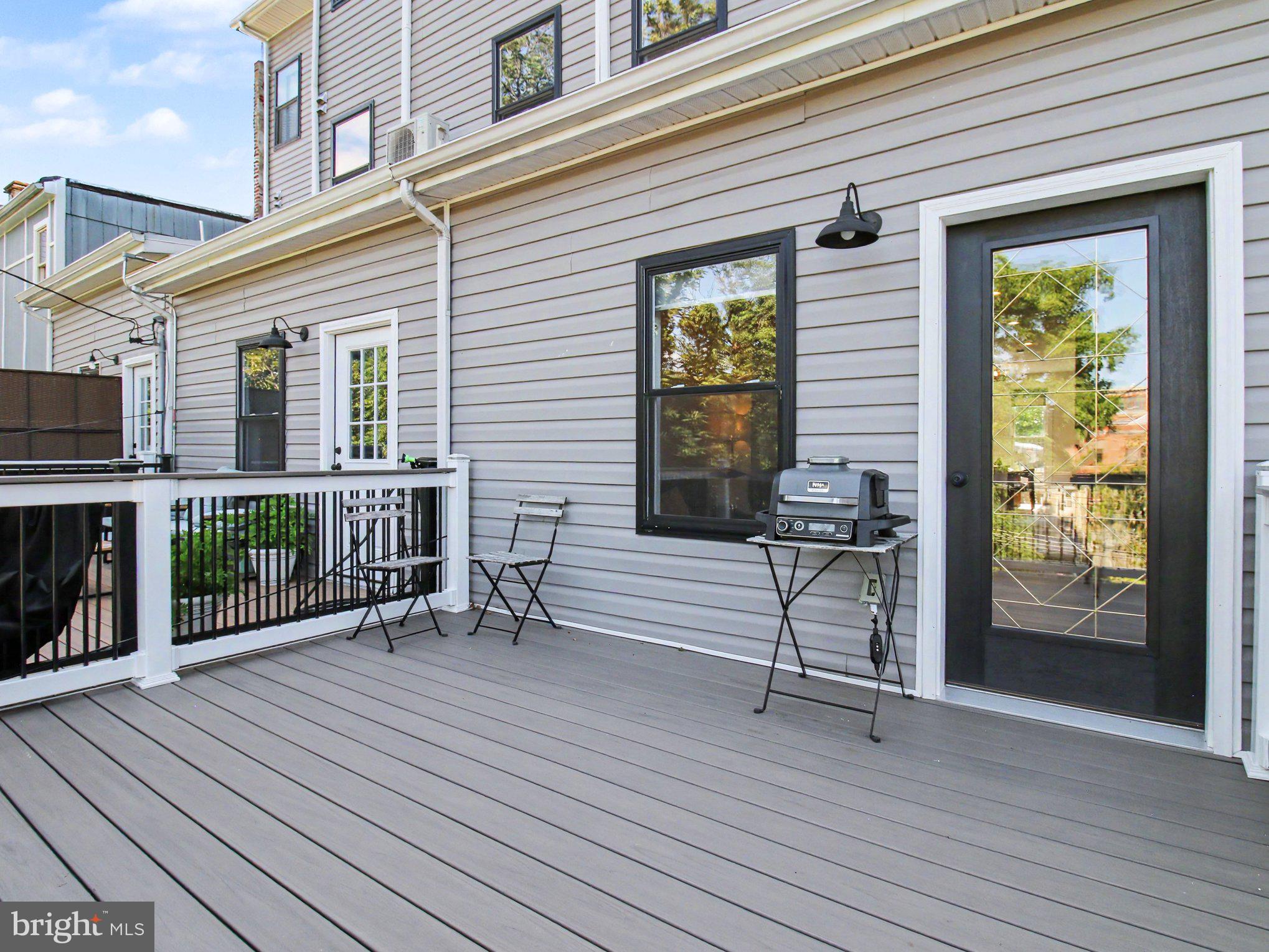 3915 Roland Avenue Baltimore, MD 21211 - Photo 23 of 26 a view of a house with backyard and porch