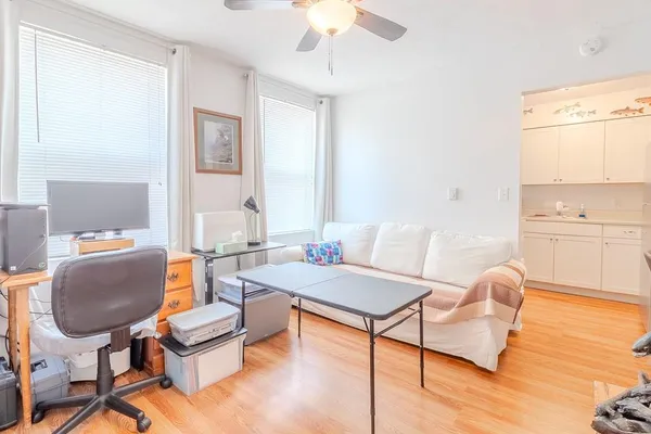 a living room with furniture and a table