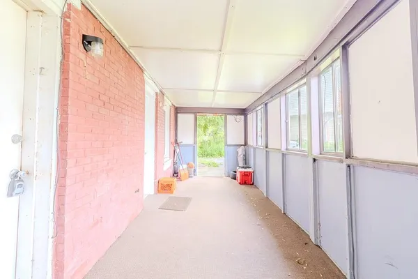 a view of a room with a large window