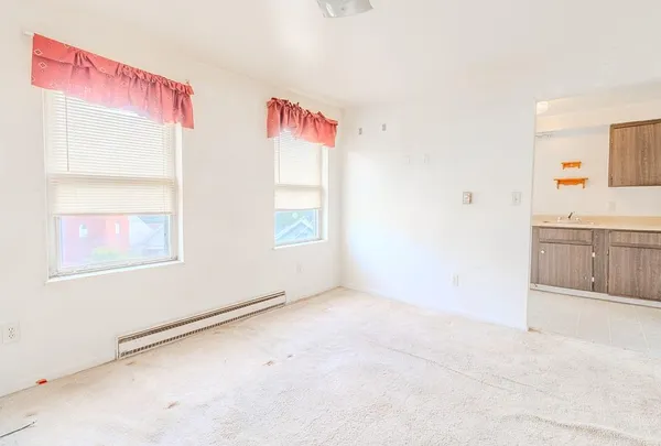 an empty room with windows