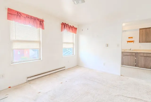 an empty room with windows