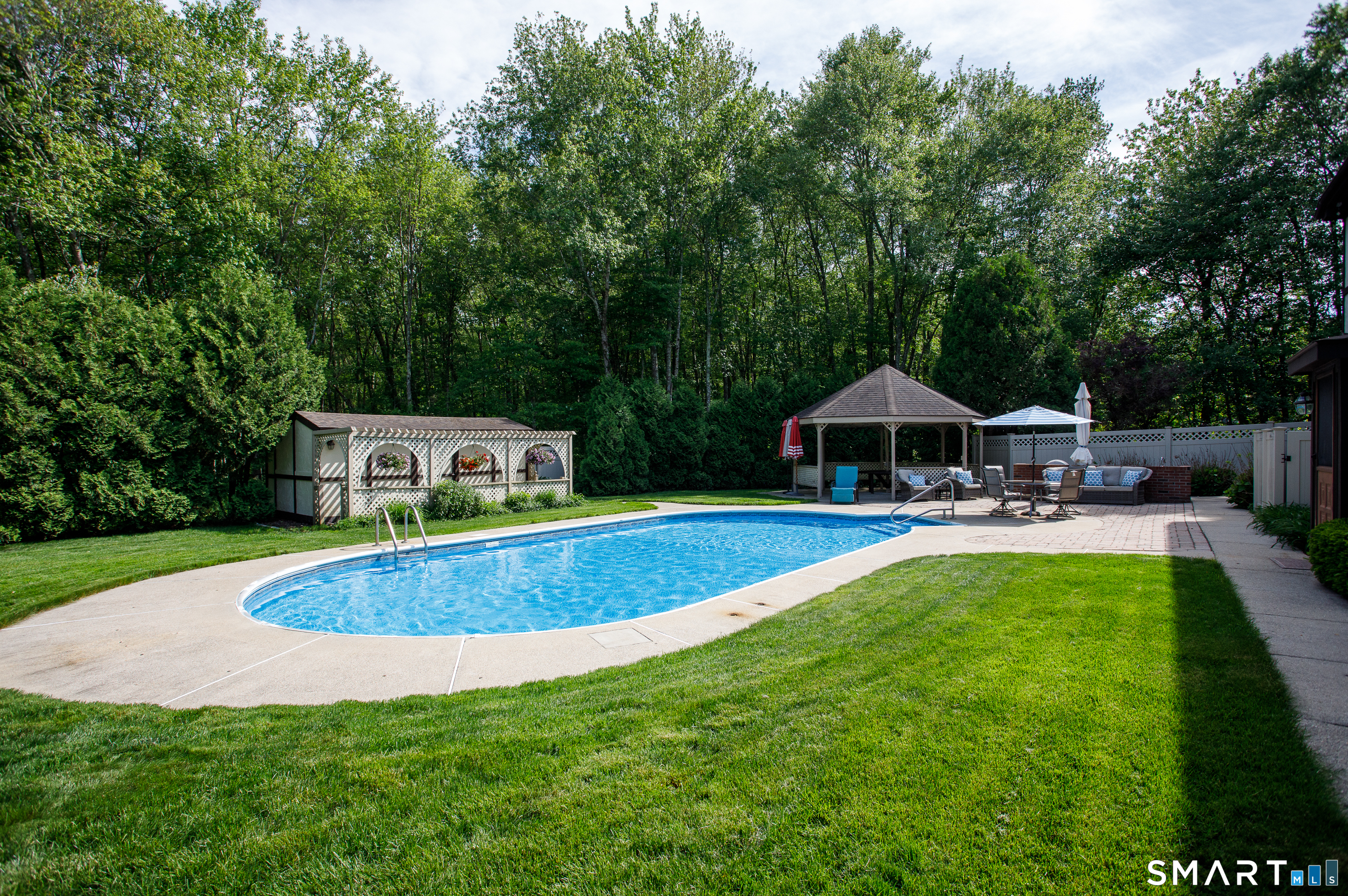 25 Stony Ridge Road Norwich, CT 06360 - Photo 37 of 40 a view of pool with table and chairs