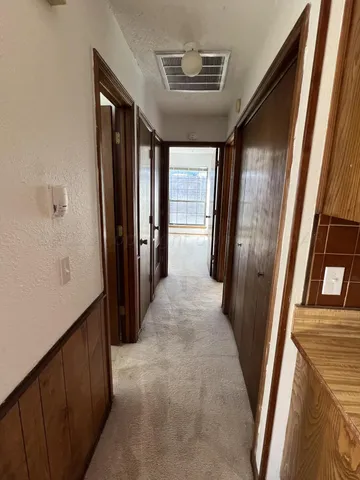 a view of hallway with stairs