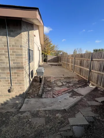 a view of a livingroom with wooden floor