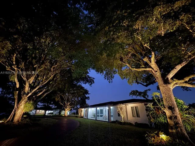 a view of yard with outdoor seating