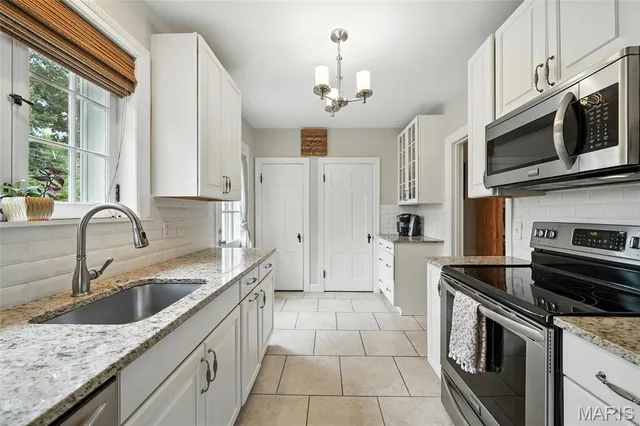 $499,999 | 7814 Gannon Avenue, University City, MO 63130