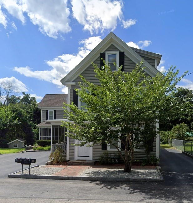 471 Gleasondale Road, Unit 1 Stow, MA 01775 - Photo 1 of 11 a front view of a house with a yard