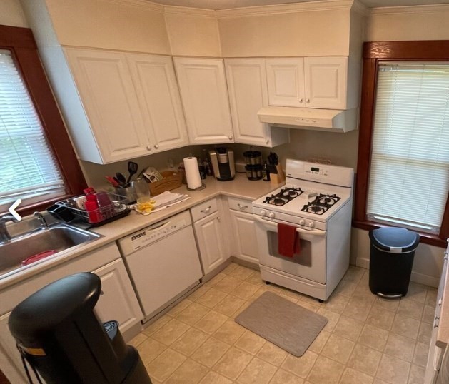 471 Gleasondale Road, Unit 1 Stow, MA 01775 - Photo 3 of 11 a kitchen with a stove and a refrigerator