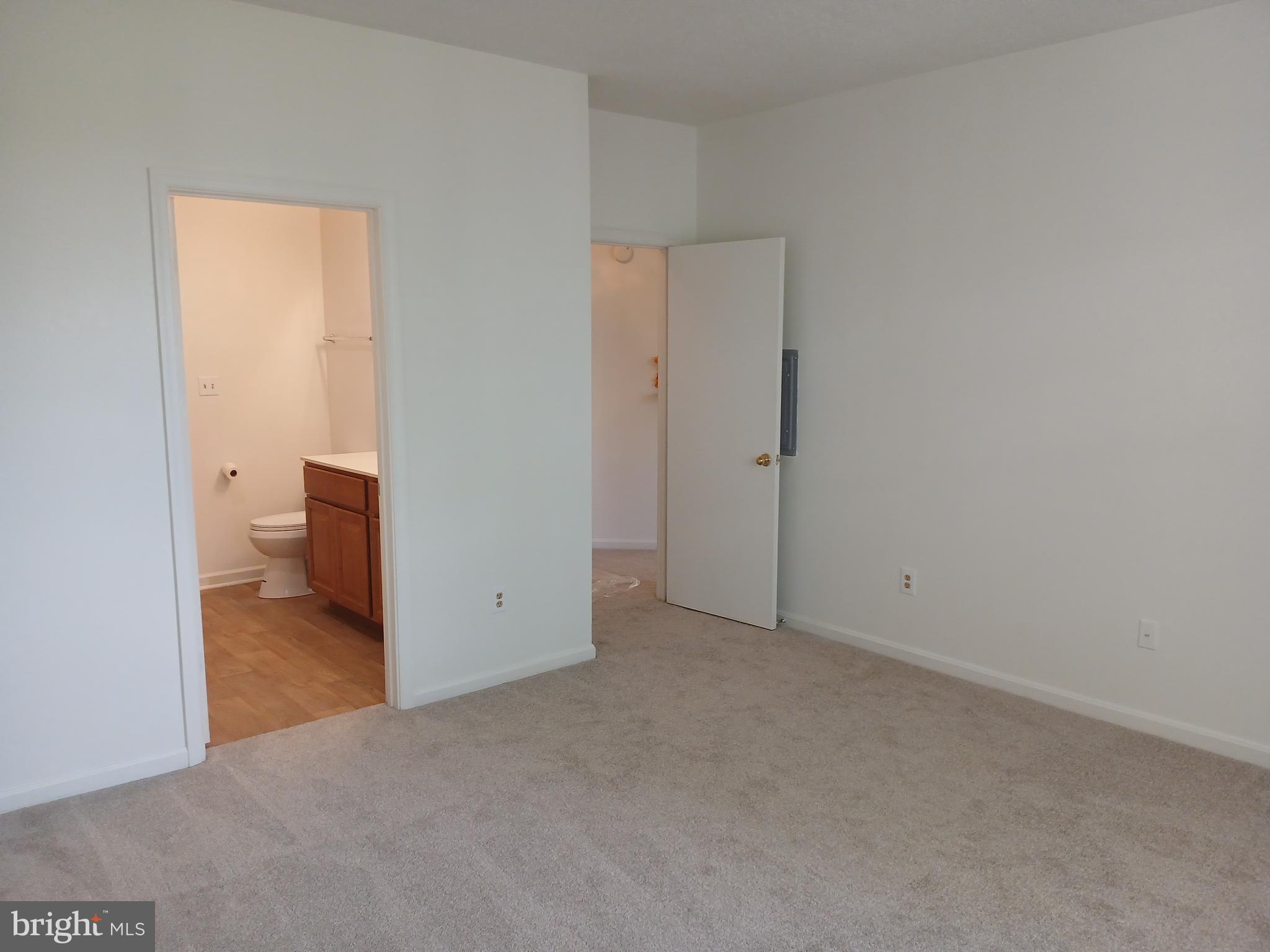 7201 Bogley Road, Unit 203 Windsor Mill, MD 21244 - Photo 15 of 21 an empty room with a bathroom